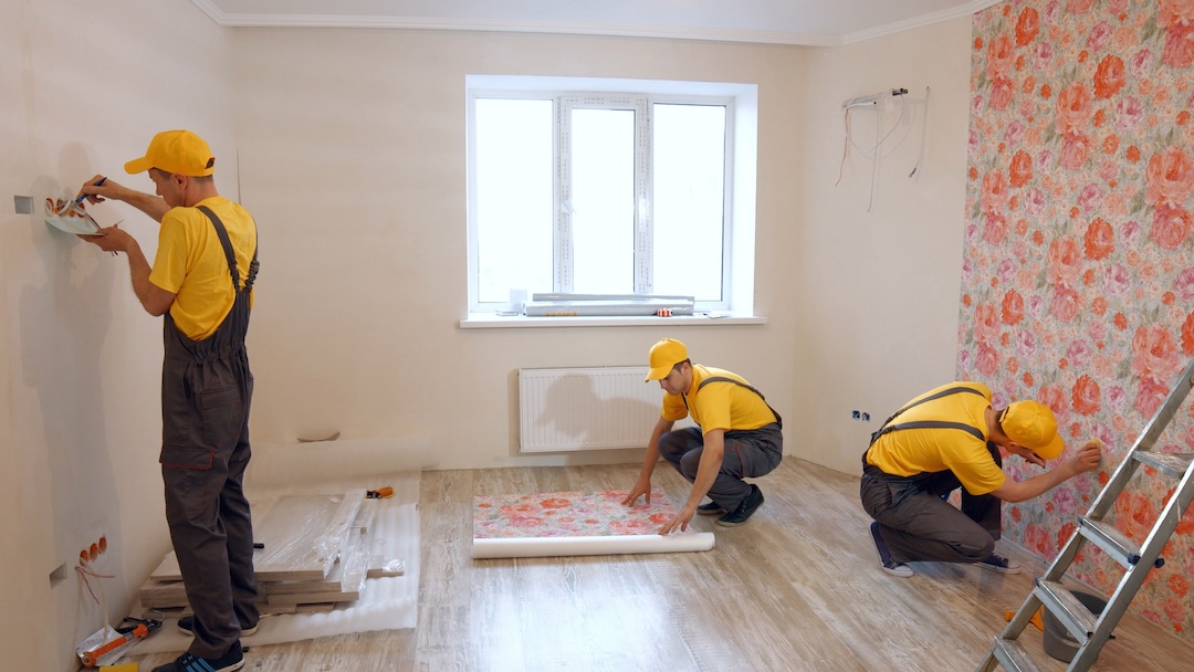 Builders doing apartment repair.